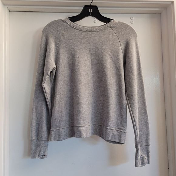 Athleta Other - Athleta girls gray sweatshirt with open back flap and  thumb opening